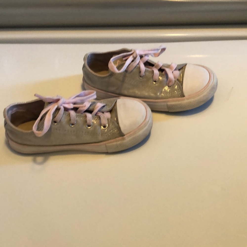 Silver and pink converse